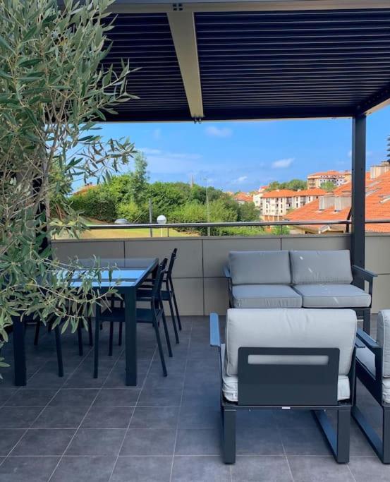 شقة Atico Con Esplendida Terraza كوميلاس المظهر الخارجي الصورة